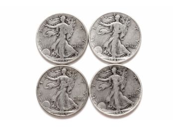 Four Walking Liberty Half Dollars