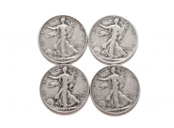 Four Walking Liberty Half Dollars