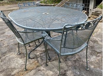 Wrought Iron Patio Table And 4 Arm Chairs