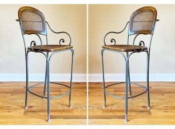 A Pair Of Wrought Iron And Cane Bar Stools - $4000 MSRP