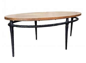 A Modern Wrought Iron And Oak Coffee Table By West Elm