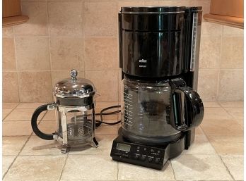 A Braun Coffee Maker And Small French Press