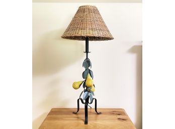 A Tole Painted Metal Art Lamp With Wicker Shade