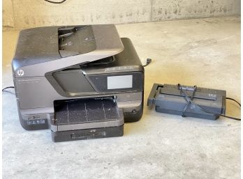 An HP Officejet Printer And Shredder