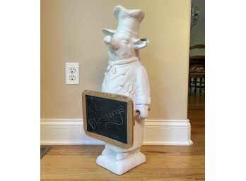 A Large Ceramic Pig Holding A Chalk Board (AS IS)