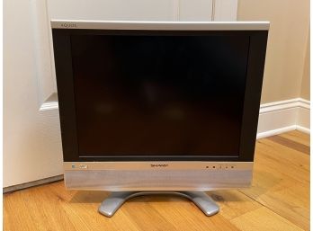 A Sharp Aquos 20' Flat Screen TV