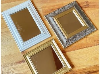 A Trio Of Small Decorative Mirrors
