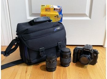 A Canon Eos Camera And Lenses