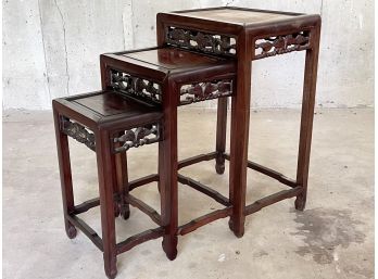 A Set Of Vintage Rosewood Chinoiserie Nesting Tables