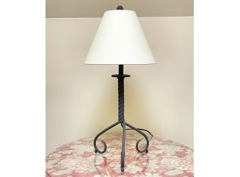 A Wrought Iron Stick Lamp