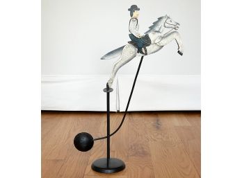 A Vintage Metal Art Horse Balancing Rocker