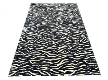 A Glamorous Modern Zebra Print Wool Area Rug By West Elm