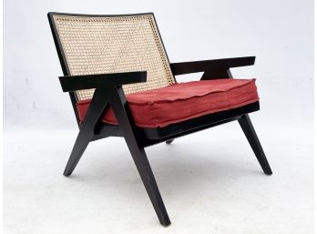 A Modern Oak And Cane Arm Chair