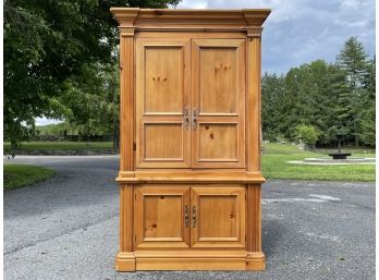 A Large Pine Wardrobe Or Entertainment Cabinet By Hooker Furniture