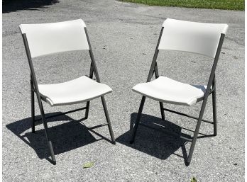 A Pair Of Acrylic Folding Chairs By Lifetime