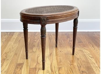 A Vintage Louis XVI Caned Vanity Seat