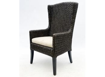 A Modern Woven Seagrass Chair And Linen Cushion By Crate & Barrel