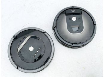 A Pair Of IRobot Roombas