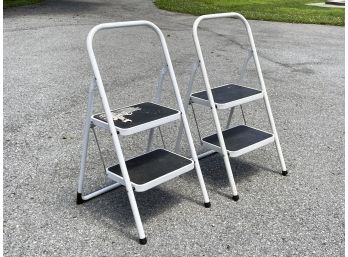 A Pair Of Metal Step Ladders