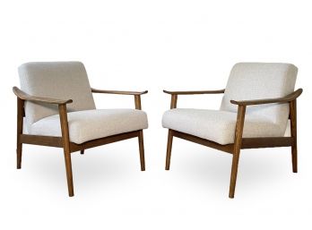 A Pair Of Modern Hardwood Arm Chairs By West Elm