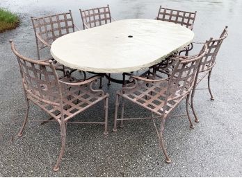 A Wrought Iron Dining Set By Frontgate