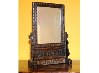 A Carved Rosewood Vanity Mirror By ABC Carpet & Home Antique Reproductions