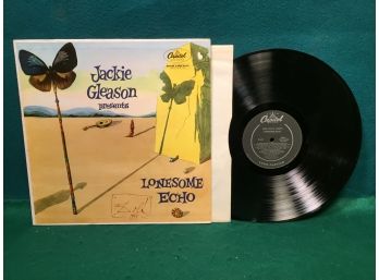 Jackie Gleason Presents Lonesome Echo On Capitol Records Mono. Vinyl Is Near Mint. Salvador Dali Cover Artwork