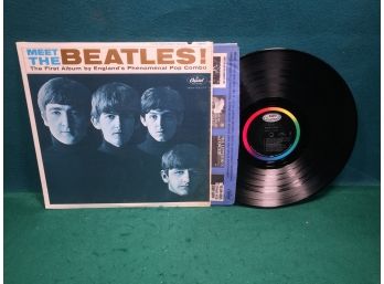 The Beatles. Meet The Beatles On Capitol Records Mono. Vinyl Is Very Good. Jacket Is Near Mint.