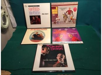 The Smothers Brothers. Five (5) Classic LP Records. All Vinyl And Jackets Very Good Plus Plus - Near Mint.