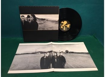 U2. The Joshua Tree On Island Records. Vinyl Is Very Good Plus Plus. Gatefold Jacket Is Near Mint.