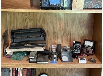 SHELF LOT OF OFFICE GOODS, INCLUDES A MAGNIFYING GLASS, MURA METER