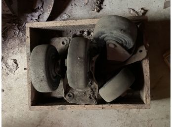 A SET OF 4 HUGE ANTIQUE INDUSTRIAL CASTORS IN ADVERTISING BOX