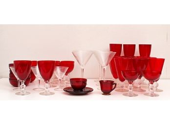 Group Of Red Glass Stemware Along With Clear Glass