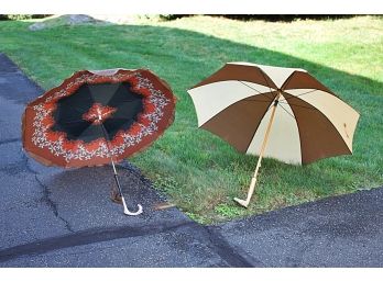 Two Umbrellas With Interesting Cane Handles