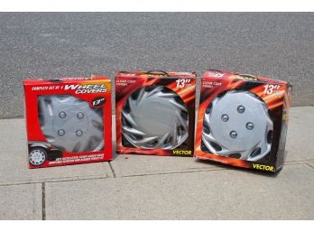 Three Boxes Of 13' Vector Wheel Covers