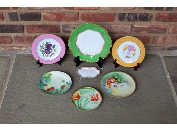 Seven Limoges Painted Plates