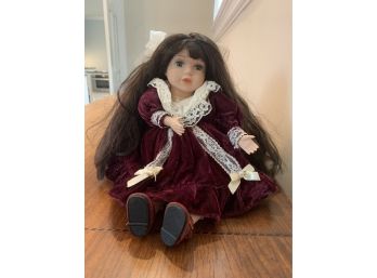 Music Box Doll With Dark Brown Hair And Ruby Colored Dress