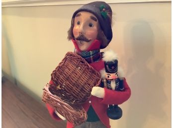 298, Caroler Holding Nutcracker