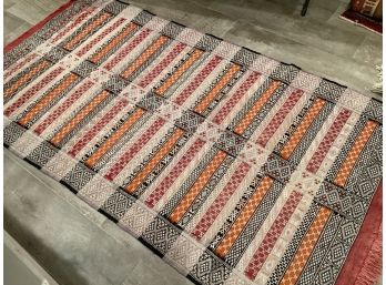 323, Black Orange, Tan And Grey Rug