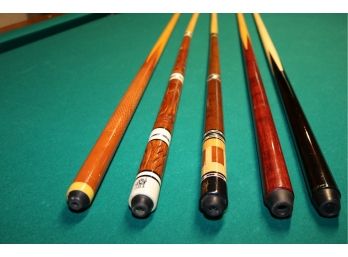 Five Imported Pool Sticks