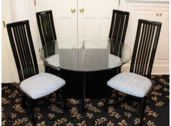 A Contemporary Glass Topped Black Lacquer Table And 4-matching Chairs