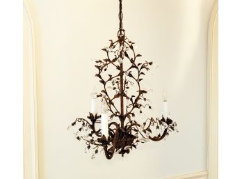 A Whimsical Wrought Iron And Crystal Chandelier