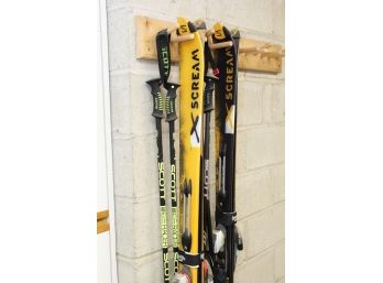 Two Pair Of Salomon X-Scream Skis And Poles