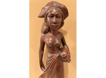 Mahogany Female Hunter  Carrying A Pig Statue