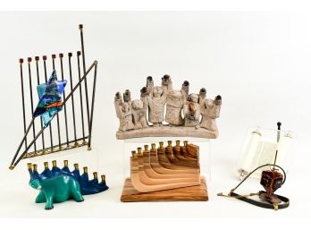 Collection Of Menorahs, Dreidel Sculpture And Hebrew Scroll