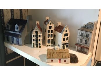 Six Miniature Houses, One Is A Piggy Bank