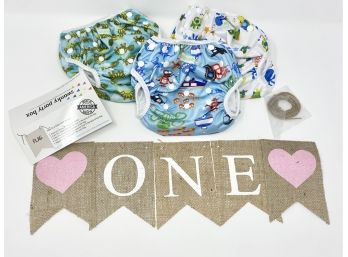 Lot Of Childrens Items - 1st Birthday Banner & Reusable Swimming Diapers