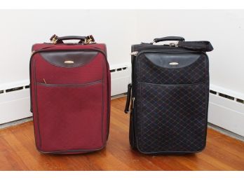 Two Pierre Cardin Rolling Suitcases.