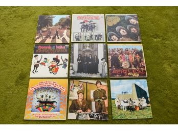 Collection Of Seven Beatles Vinyl Records, Empty Vinyl Cover, And Two Memorabilia Magazines