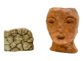 Pair Of Pottery Face Sculptures